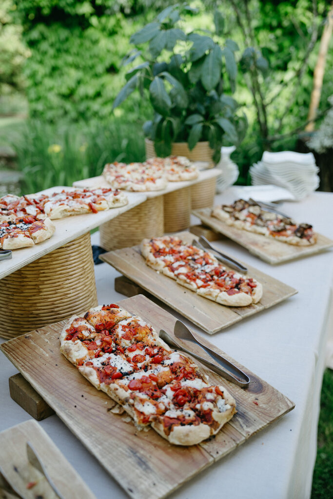 Freshly baked focaccia with toppings at wedding reception in italy